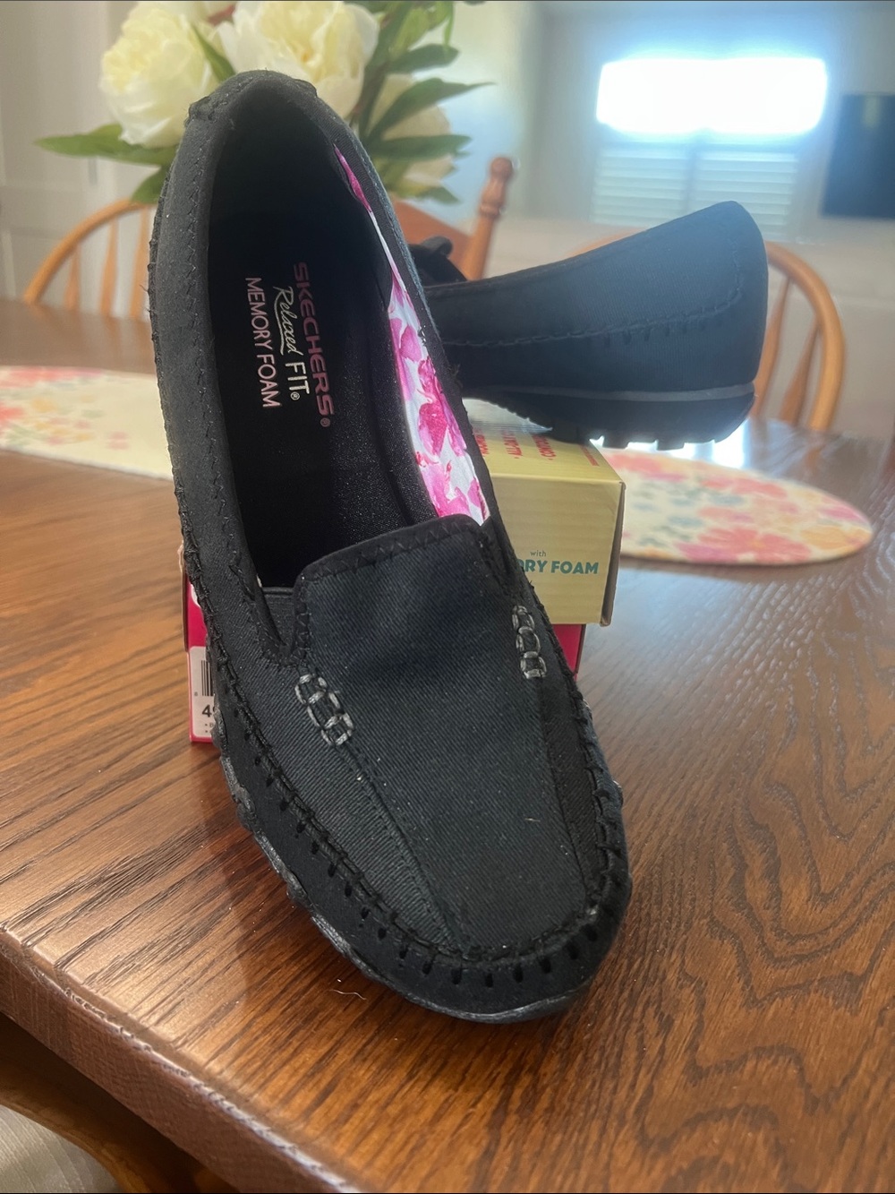 Skechers Kids Black Slip-On Moccasins with Pink Floral Lining